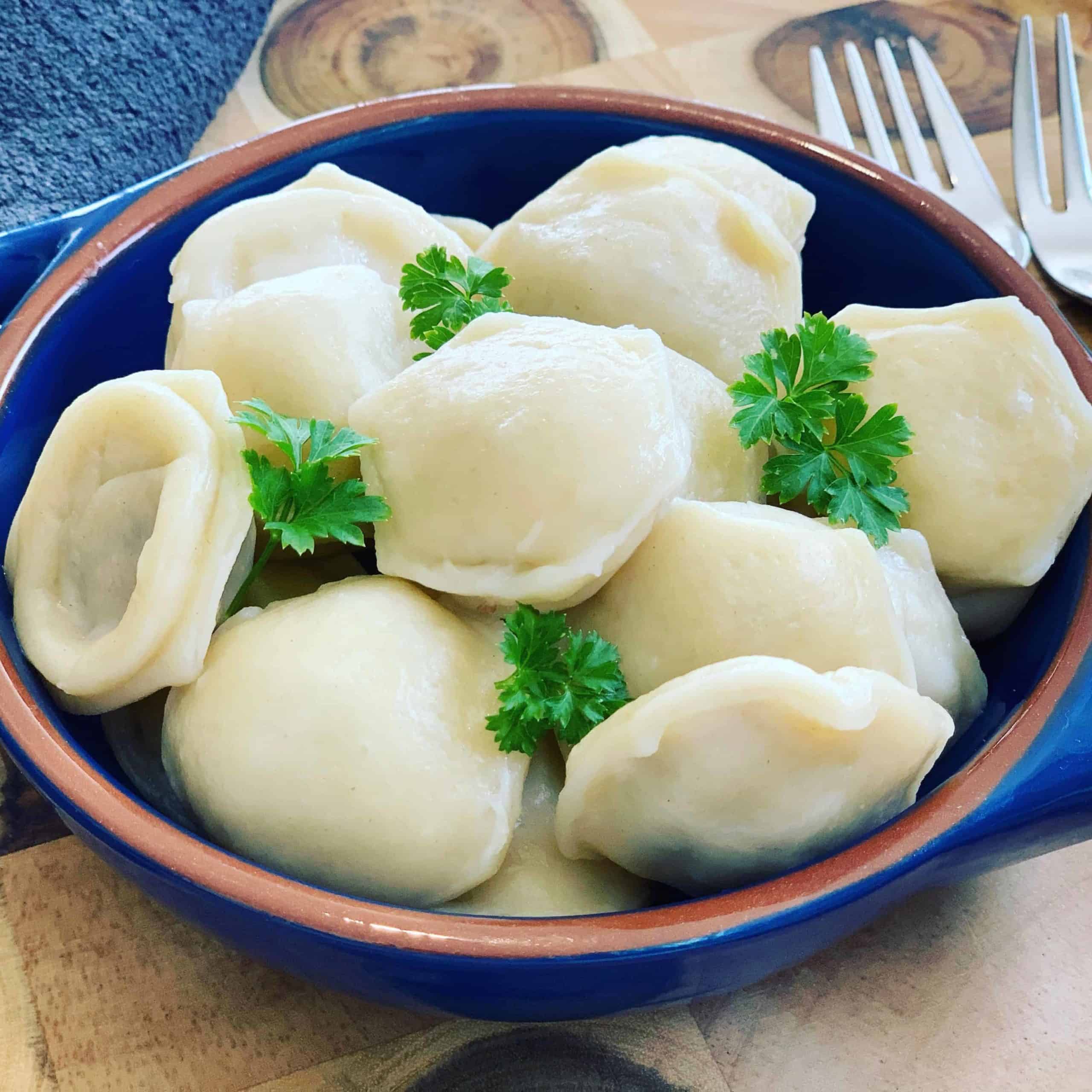 These Russian dumplings are so much quicker with this shortcut using a Pelmenitsa Mold! Filled with turkey meat and onion with an Asian twist - How to make Siberian Ravioli Pelmeni using a Mold