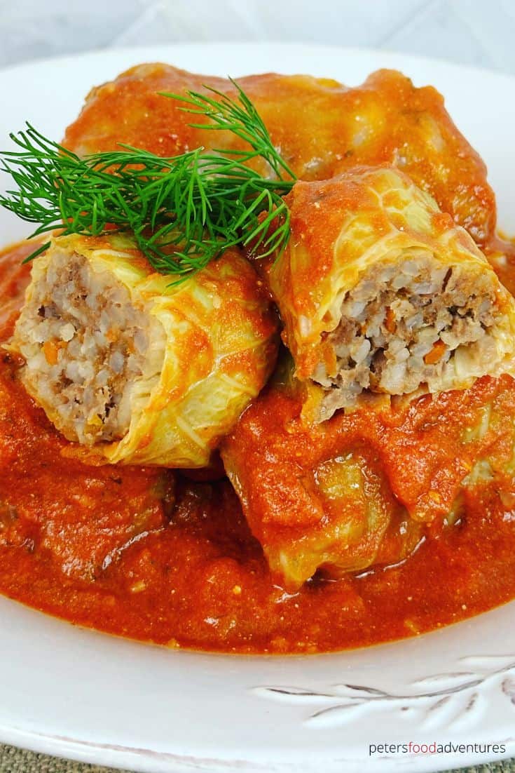 cabbage rolls stacked on a plate