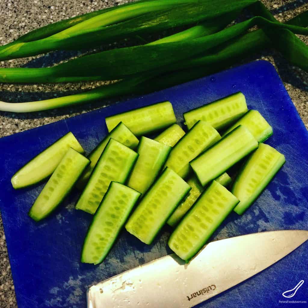 Slicing cucumbers for Rice Salad