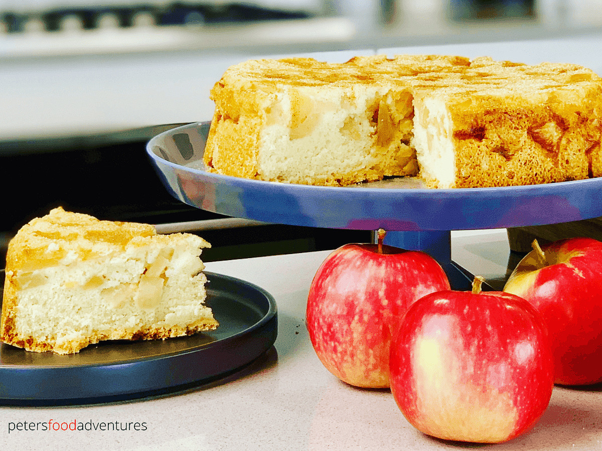 apple cake with a slice on a plate