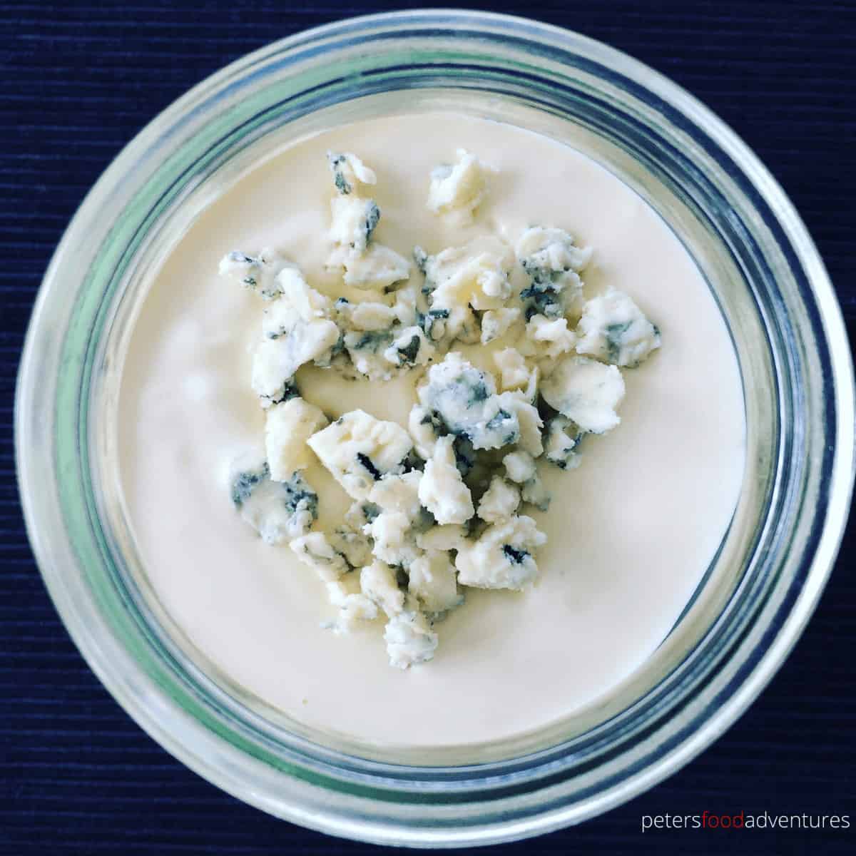 After trying this Homemade Blue Cheese Dressing Recipe, you'll never buy store-bought again. The best part is that it only takes 5 minutes to make! Perfect for salads, veggies or even on a baked potato.