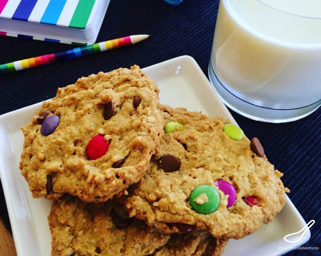 The Best Monster Cookies recipe you'll try. Everything you want in a cookie like oats, smarties, chocolate chips, peanut butter! This large batch recipe makes enough to feed a small army! 