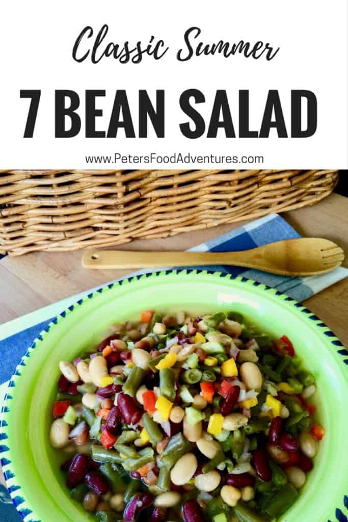 bean salad in a bowl beside a picnic basket