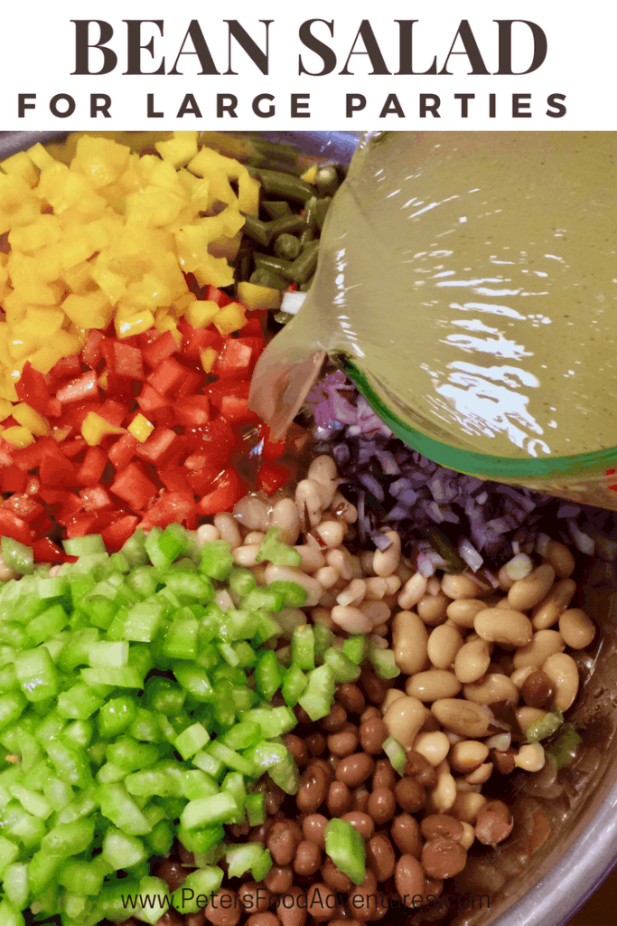 pouring dressing over bean salad