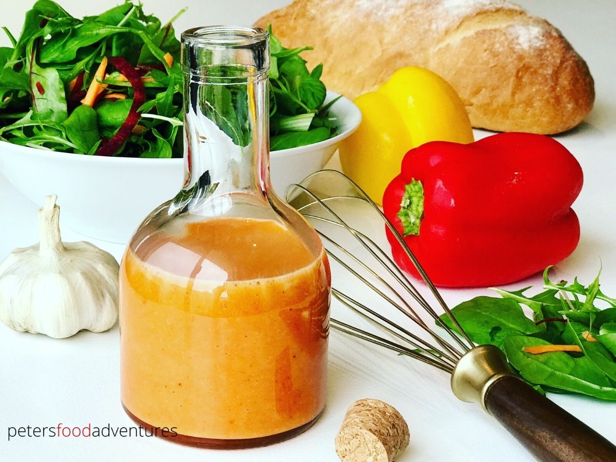 french dressing in a bottle beside a salad