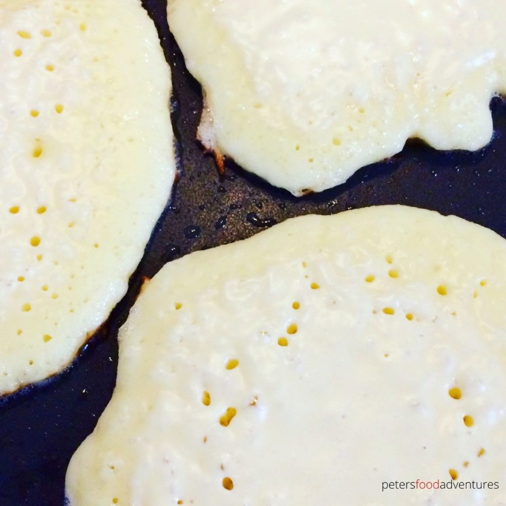 frying kefir pancakes with bubbles