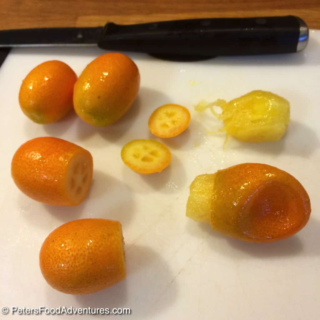 pinching kumquats to remove skins