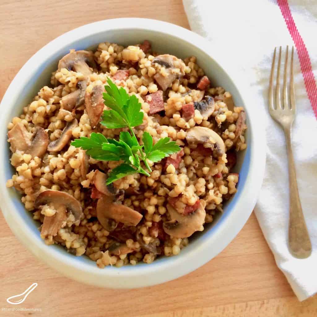 A tasty side dish that's incredibly healthy. Buckwheat is a superfood that is popular in Eastern Europe, low GI, gluten free and a perfect side dish like rice-a-roni! Buckwheat Kasha with Mushrooms and Bacon (Гречневая каша с грибами)