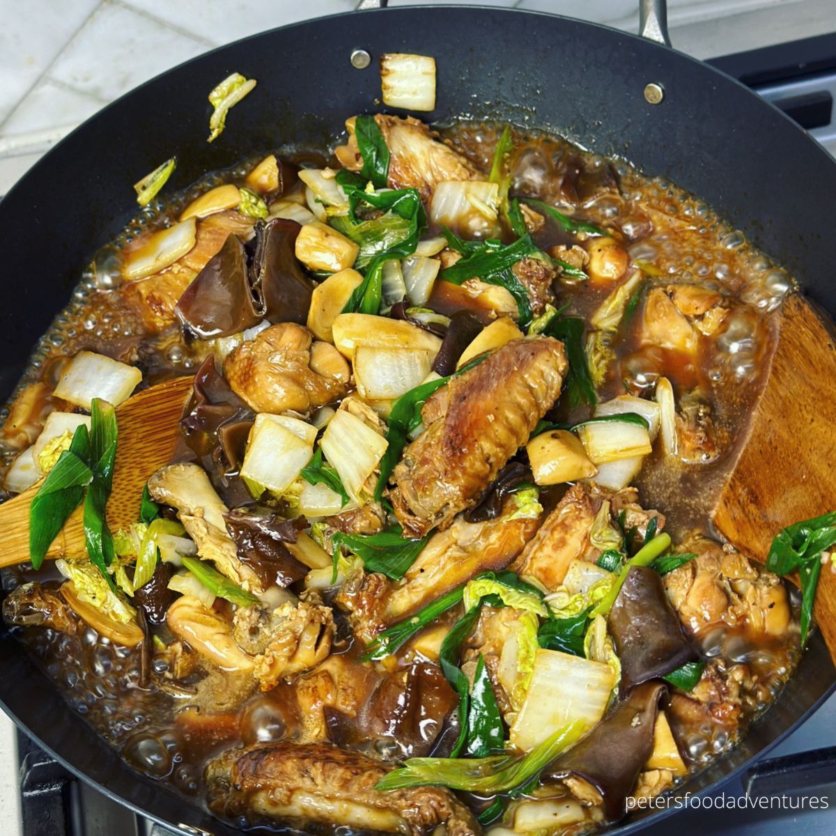 chicken wing stir fry in wok