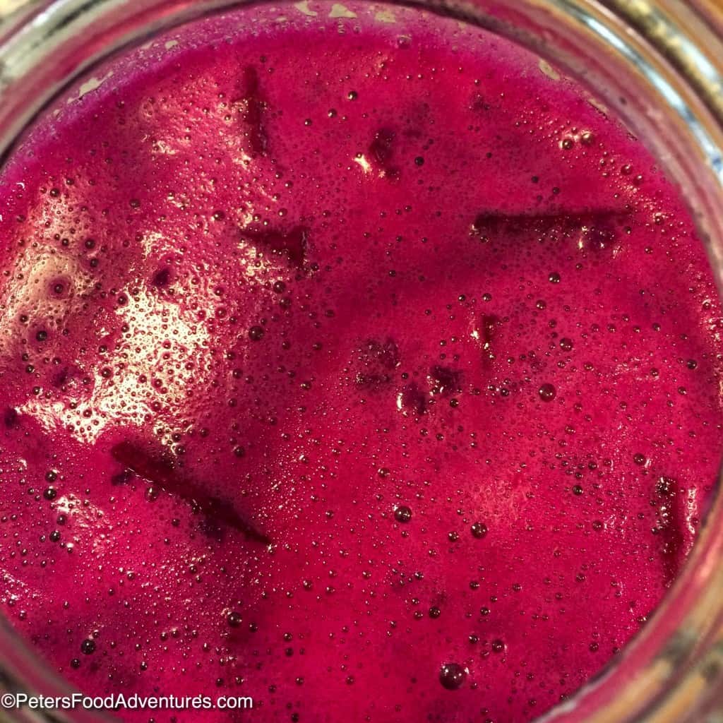 Bright Pink Beet Kvass Fermenting with bubbles