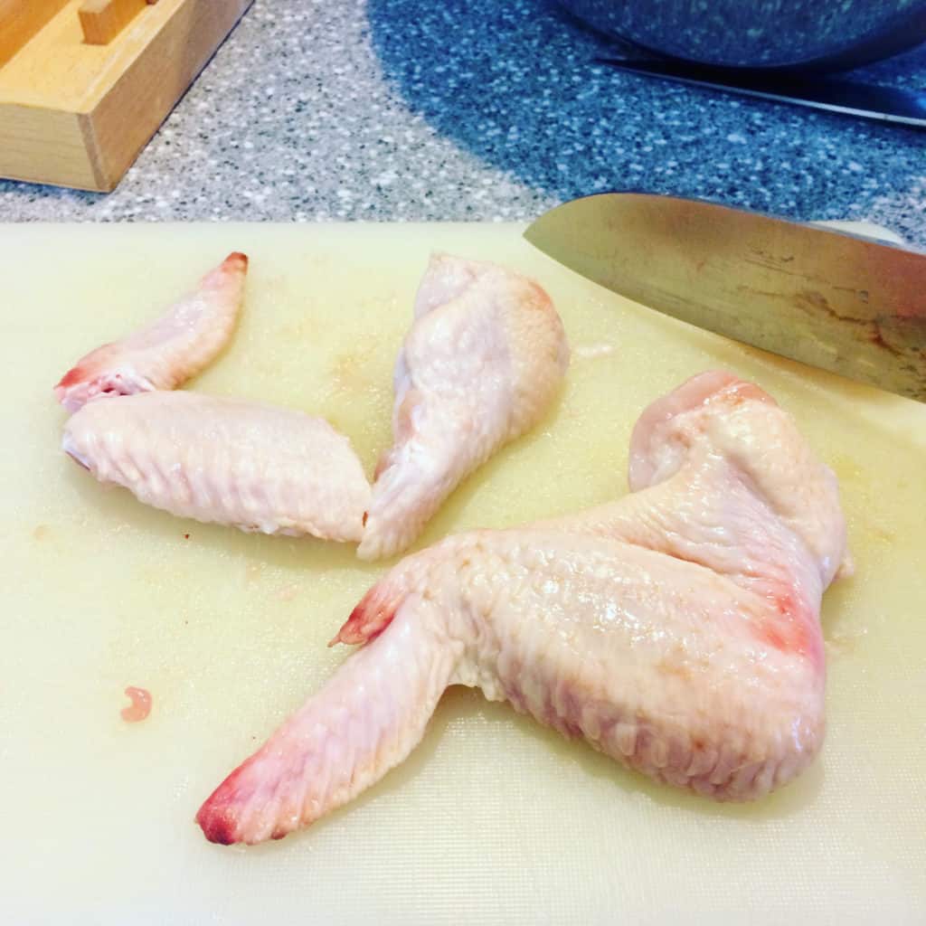 slicing chicken wings