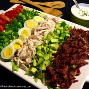 This recipes a keeper! Packed with vegetables, bacon and time saving Bbq roast chicken! Plus an amazing Bleu Cheese Dressing Recipe! Easy Cobb Salad Recipe