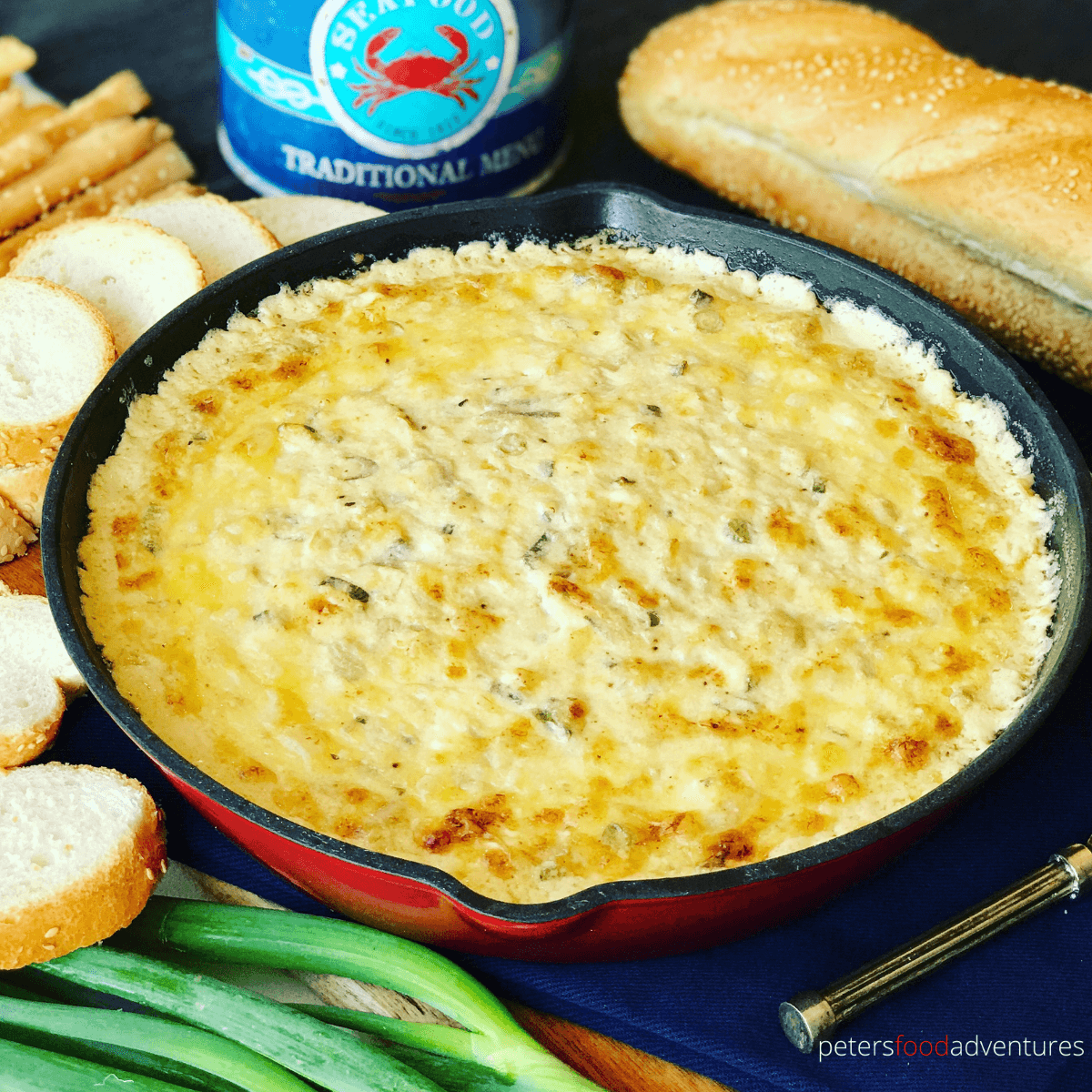 Hot Baked Crab and Artichoke Dip, Super Cheesy! Easy to make, leaving you wanting more. The perfect appetizer for party food! Crab Artichoke Dip