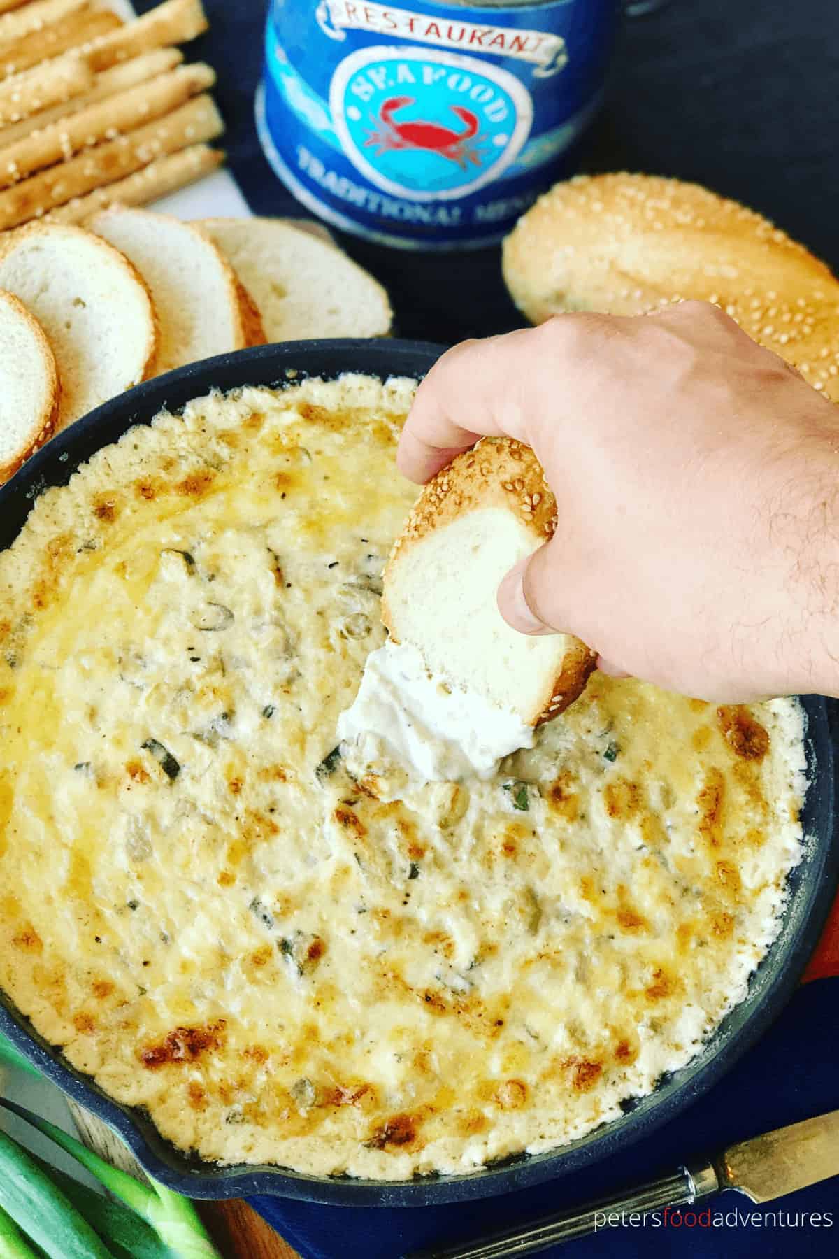 Hot Baked Crab and Artichoke Dip, Super Cheesy! Easy to make, leaving you wanting more. The perfect appetizer for party food! Crab Artichoke Dip