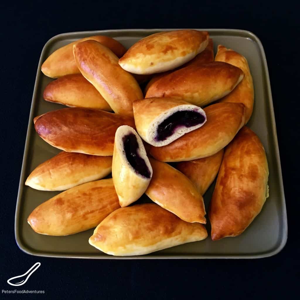 Baked Not Fried! A Sweet Dough Russian Hand Pie Filled with Blueberries, made so much quicker with this easy bread maker yeast dough recipe. Baked Blueberry Piroshki (Пирожки в духовке с голубикой)
