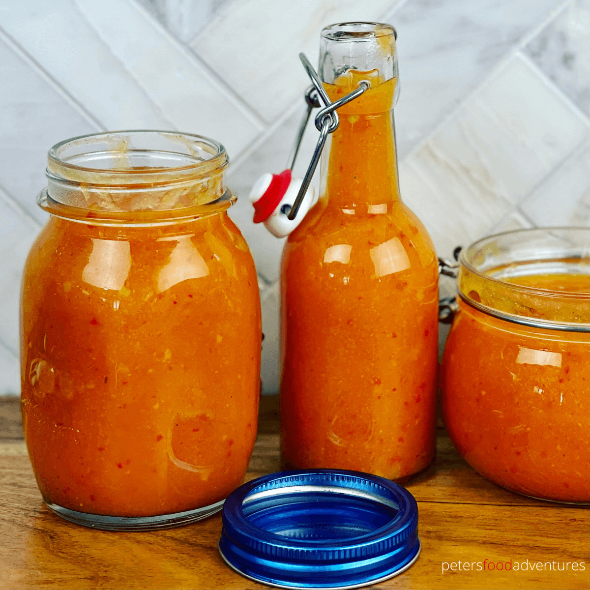 This Chili Mango Sauce is the perfect blend of sweet and spicy sauce. Delicious with seafood, chicken or pork, or as a dipping sauce. Easy to make with an explosion of tropical flavor, packs the perfect punch, extra spicy if you use habaneros! Not too spicy, not too sweet but just right!