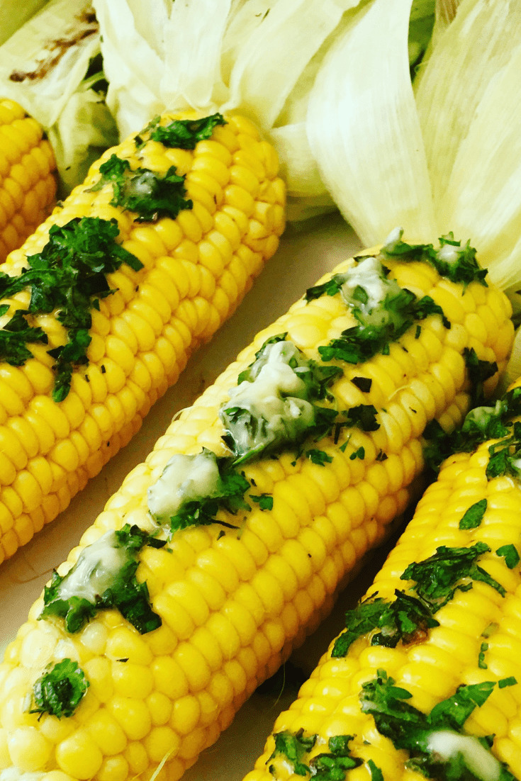 Close up of Grilled Corn with fresh herbs and butter