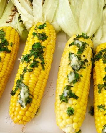 Grilled Corn on the Cob in Husk smothered in herb butter