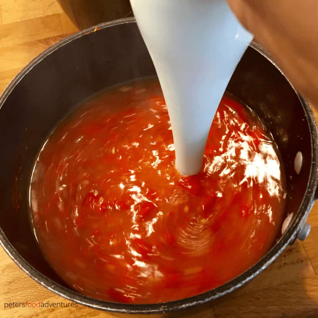 blending peppers in a pot