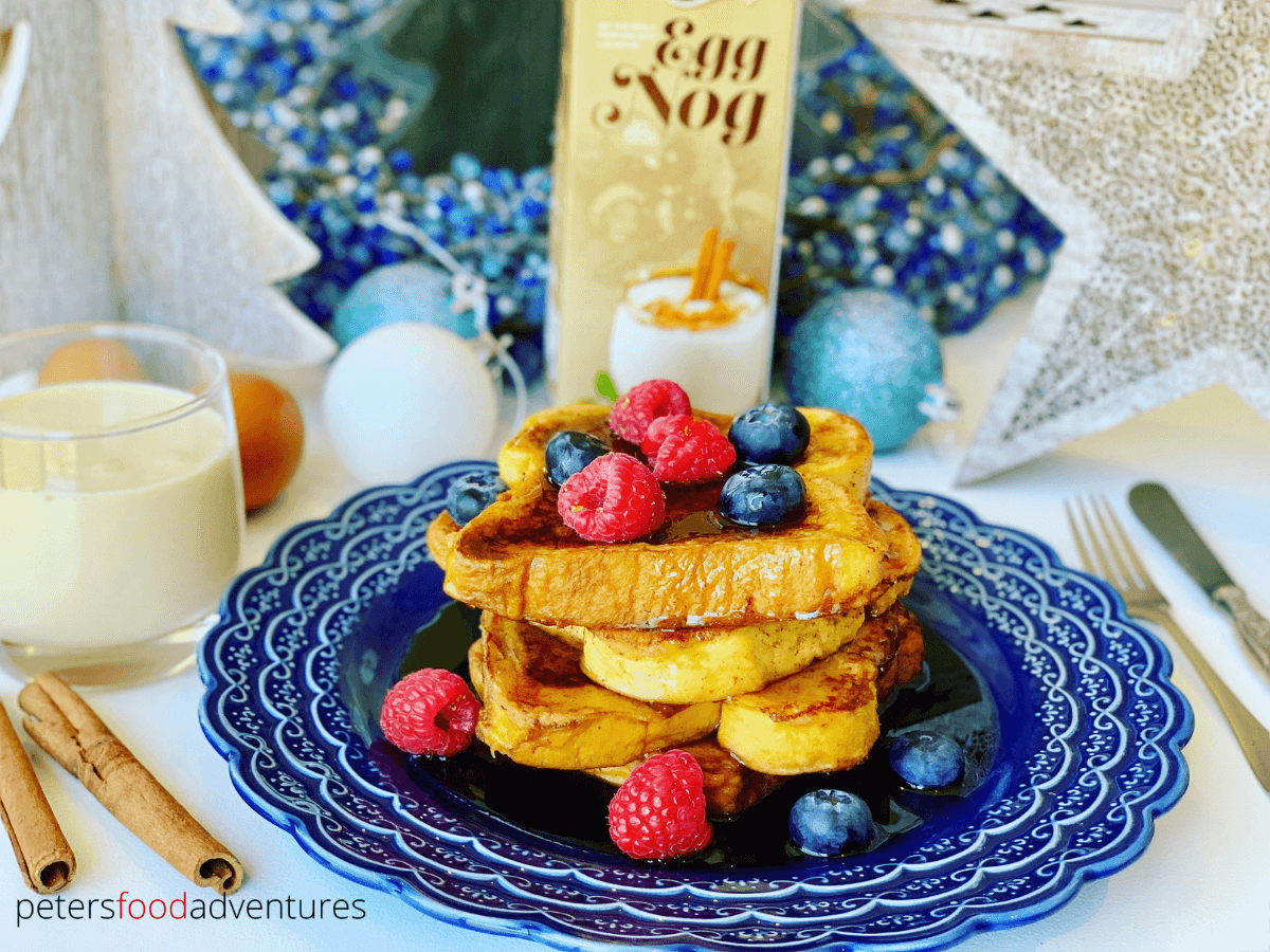 Eggnog French Toast is the perfect Christmas morning breakfast treat. Delicious and easy to make. Made with cinnamon and nutmeg, served with maple syrup and whipped cream. 