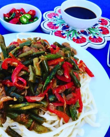 A delicious Central Asian classic, hand pulled noodles with a soupy vegetable beef Stir Fry served with Chinese Black Vinegar. Made from scratch, or substitute noodles and serve with the tasty Stir Fry. Lagman Uyghur Stir Fry (Лагман)