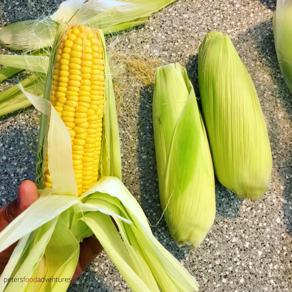 peeling corn husks