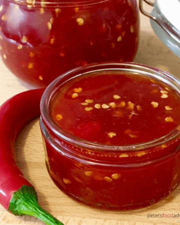This Homemade Thai Sweet Chili Sauce has so much flavor with red chilis, garlic and ginger. An exotic sauce that's sweet and spicy, a perfect dipping sauce, marinade and flavor booster! Known as name chim (น้ำจิ้มไก่) which means dipping sauce for chicken