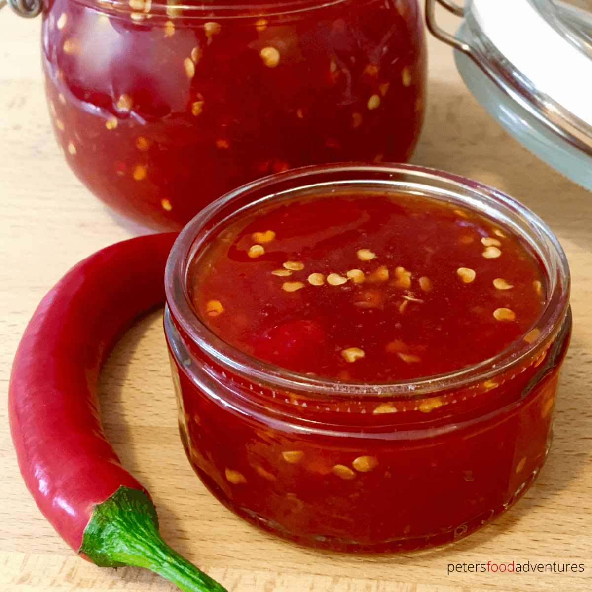 This Homemade Thai Sweet Chili Sauce has so much flavor with red chilis, garlic and ginger. An exotic sauce that's sweet and spicy, a perfect dipping sauce, marinade and flavor booster! Known as name chim (น้ำจิ้มไก่) which means dipping sauce for chicken