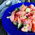 This Creamy Tomato Cucumber Salad is an easy rustic Russian salad, made with tomatoes, green onions, cucumbers, dill and whipping cream. A tasty addition to your summer salad dinner recipes.