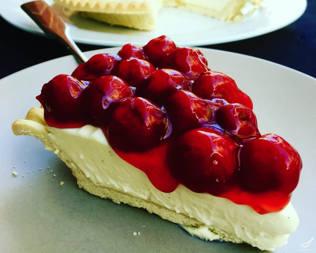 Slice of No-Bake Cherry Cheesecake takes only 5 minutes to make! It's incredibly easy and a tasty crowd pleaser. Only 4 ingredients for the filling, a great recipe to introduce 'baking' to the kids!