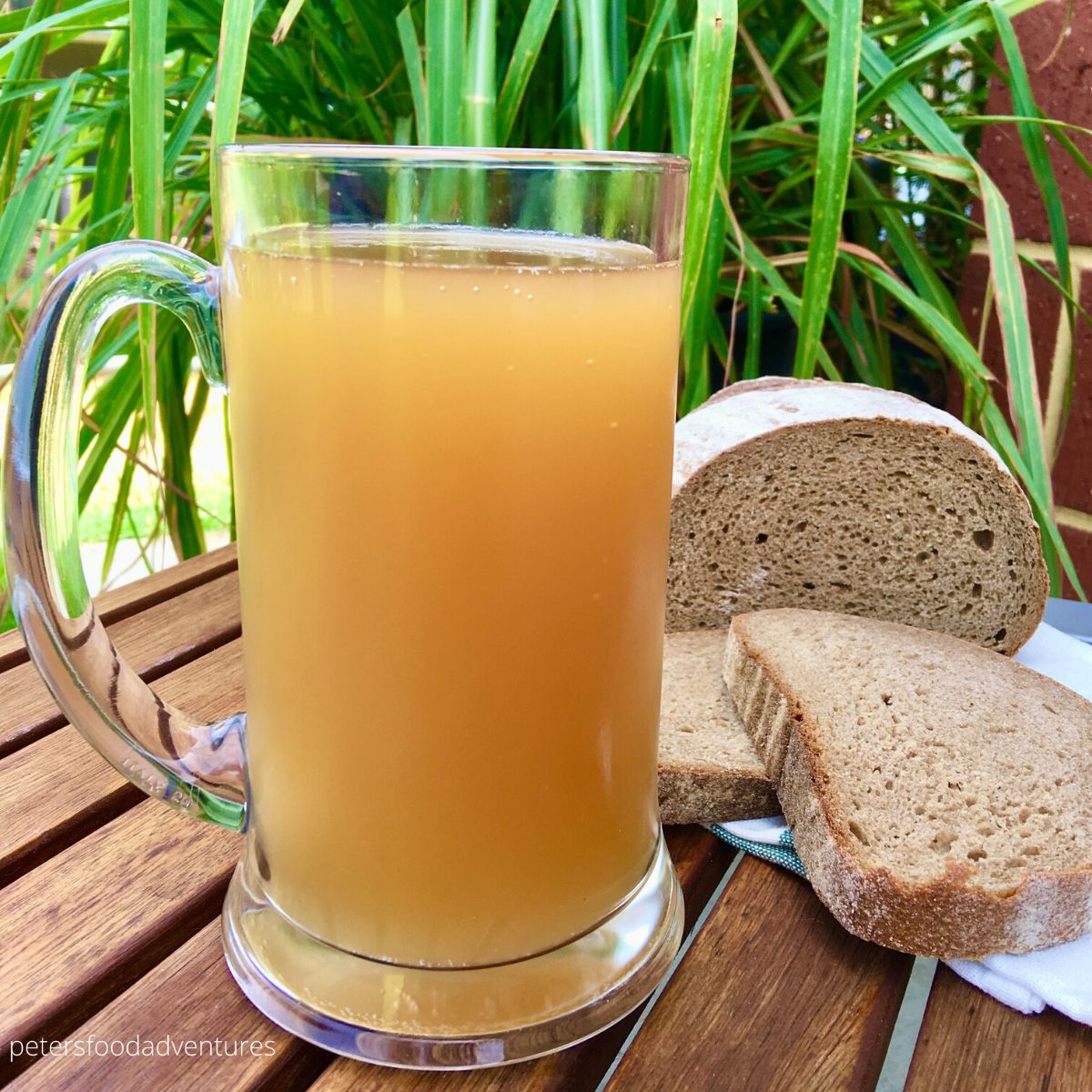 bread kvass in a pin with loaf of bread