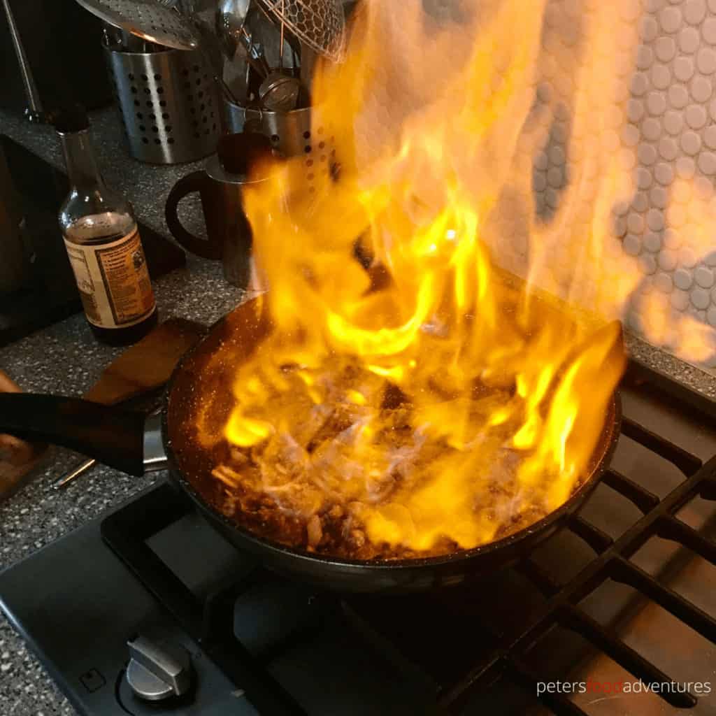 flambe fire in a frying pan when making diane sauce