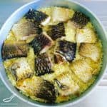 Rustic, real, simple and easy to make One Pot fish meal. Also known as Pot Rice or Baked Rice, commonly made with chicken as well - Macedonian Fish with Rice (Македонски риба со ориз)