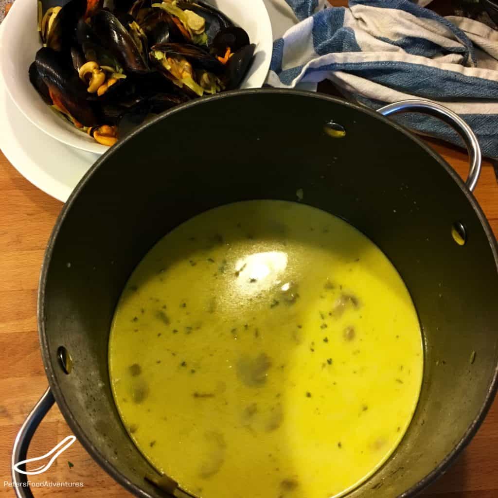 White wine sauce for mussels with turmeric in a pot