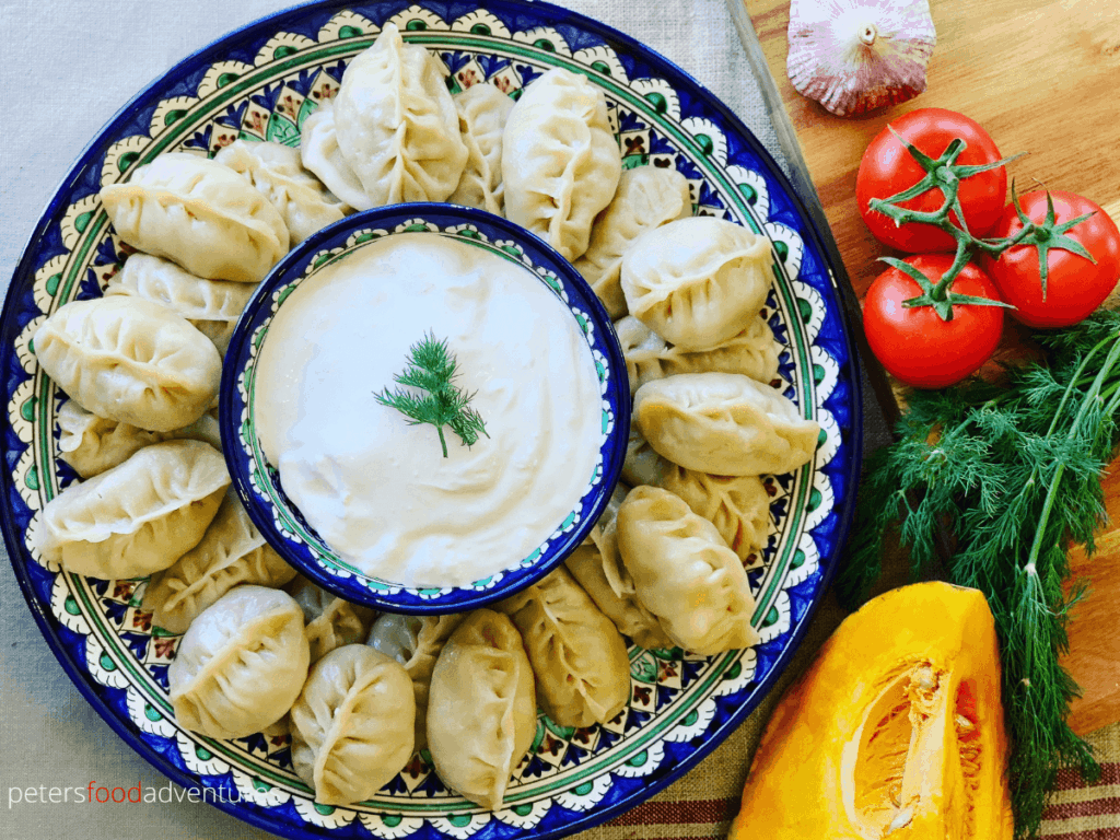 Uyghur Manti Steamed Dumplings made with ground beef and pumpkin. Popular across Russia, Kazakhstan and Uzbekistan. Delicious with sour cream - Manti (Манты)