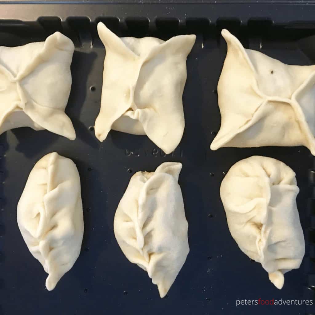 different styles of manti on a tray