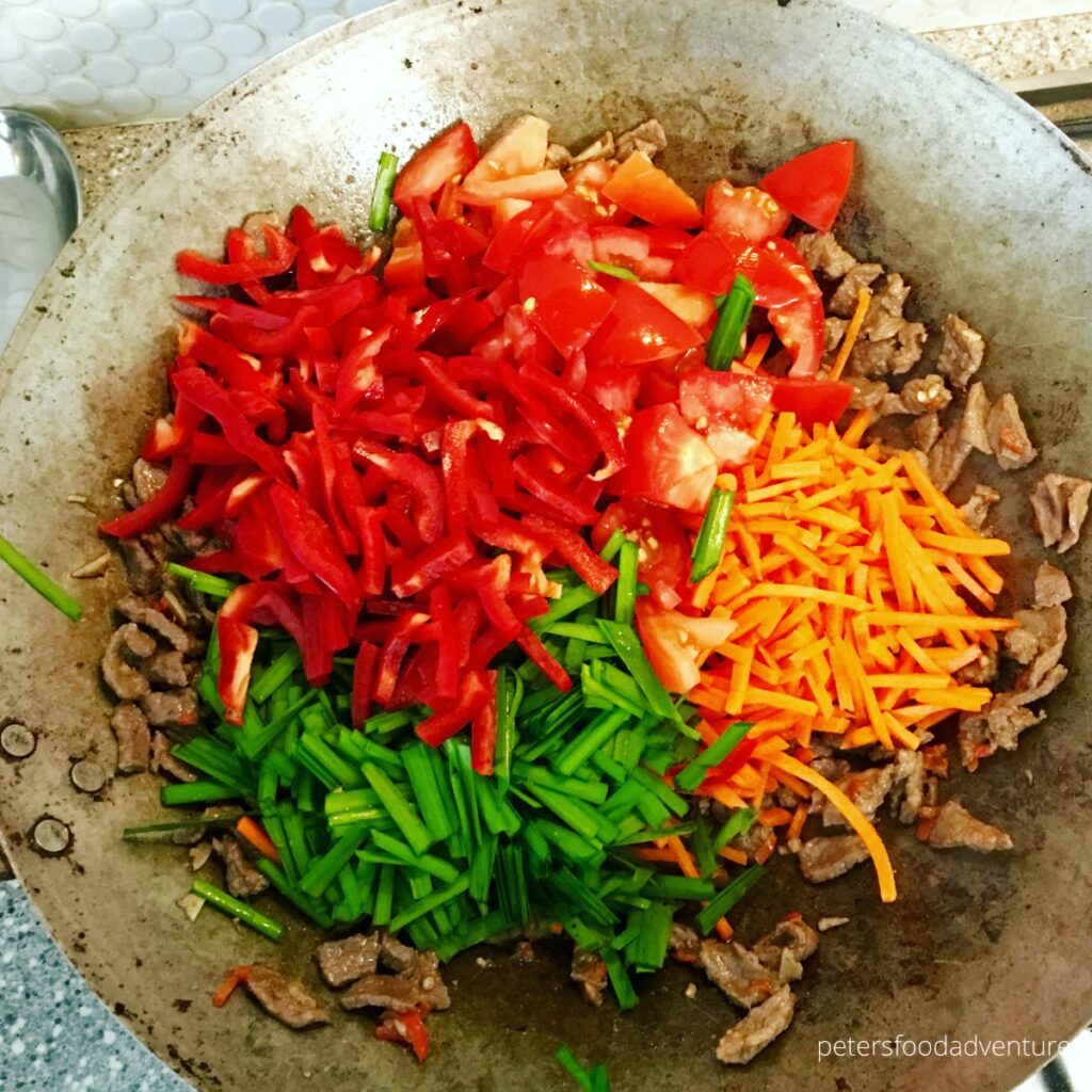 frying vegetables in wok