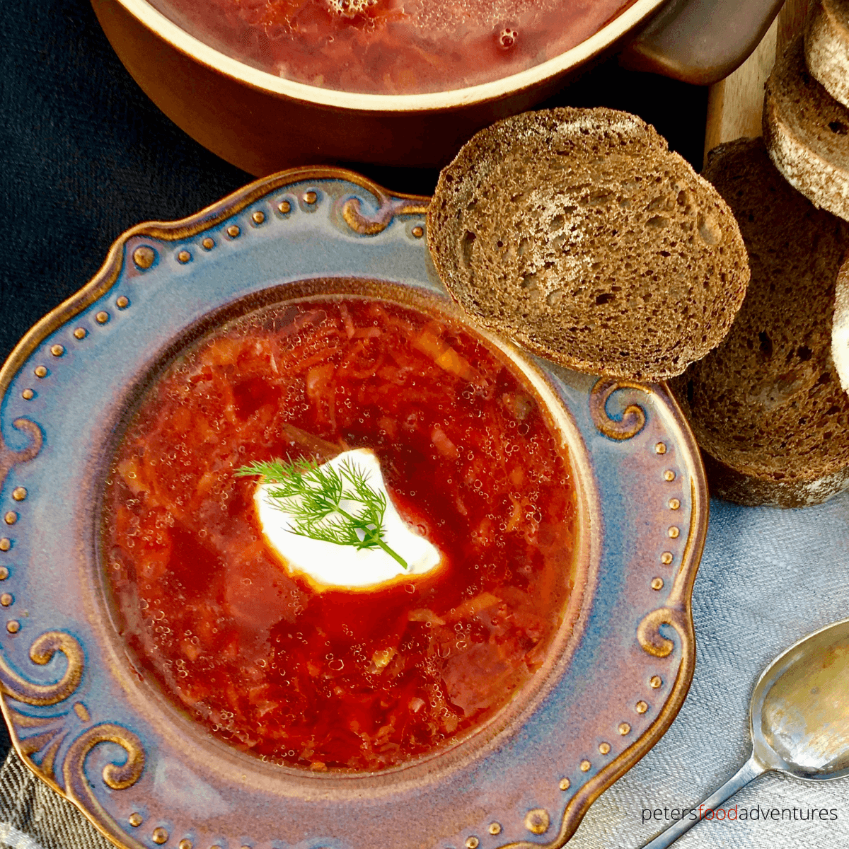 Authentic Beet Borscht with a meaty broth, cabbage, carrots, potatoes and beets. The tastiest beet soup that's easy, delicious and heartwarming. Borsch (Борщ) is so popular, that it was even eaten by Soviet cosmonauts in space.