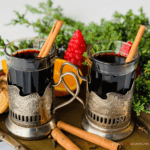 A Swiss-German Hot Mulled Wine that is enjoyed during the holidays, or when it's cold outside. Similar to Glogg, Quentao, Vin Chaud and Glintwein. Perfect for the holidays, It tastes like Christmas in a cup. Gluhwein recipe