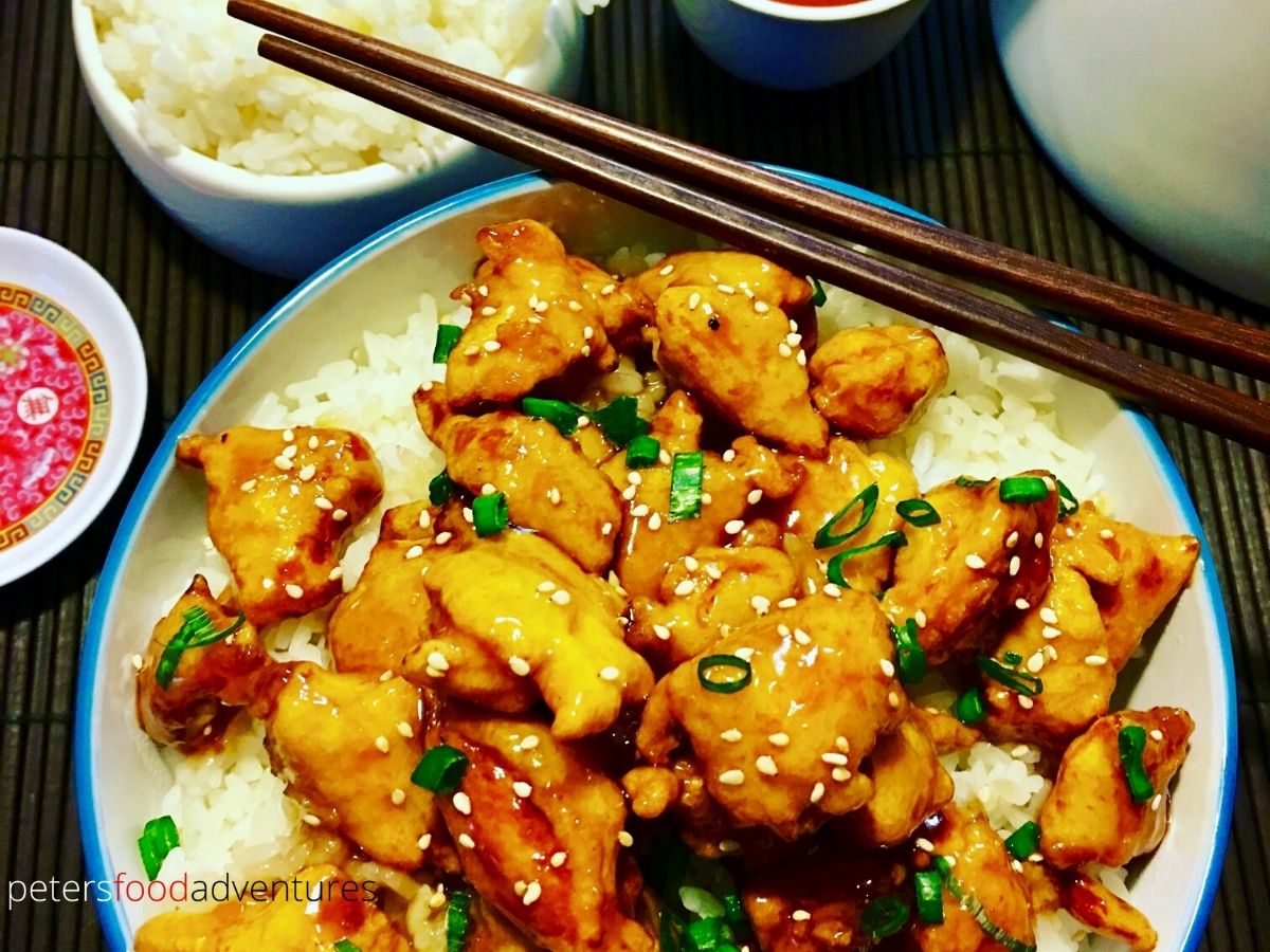 sesame chicken for dinner with chopsticks