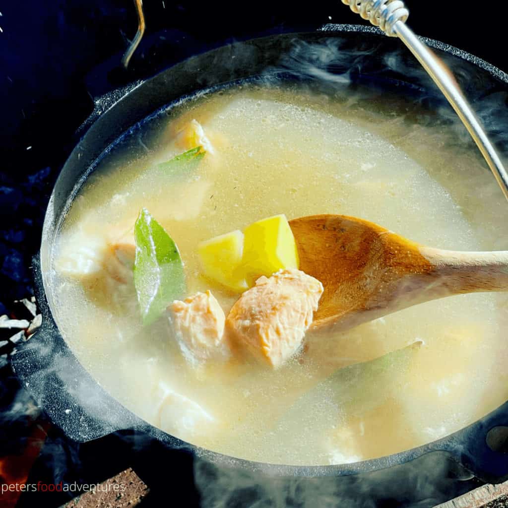 ukha soup on a wooden spoon
