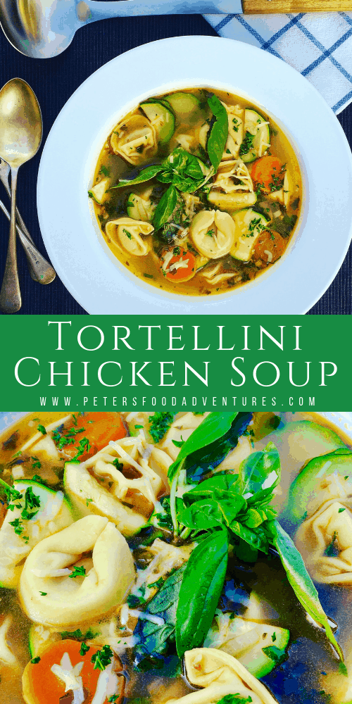 Chicken Tortellini Soup with fresh basil, bacon, zucchini and vegetables in a bowl