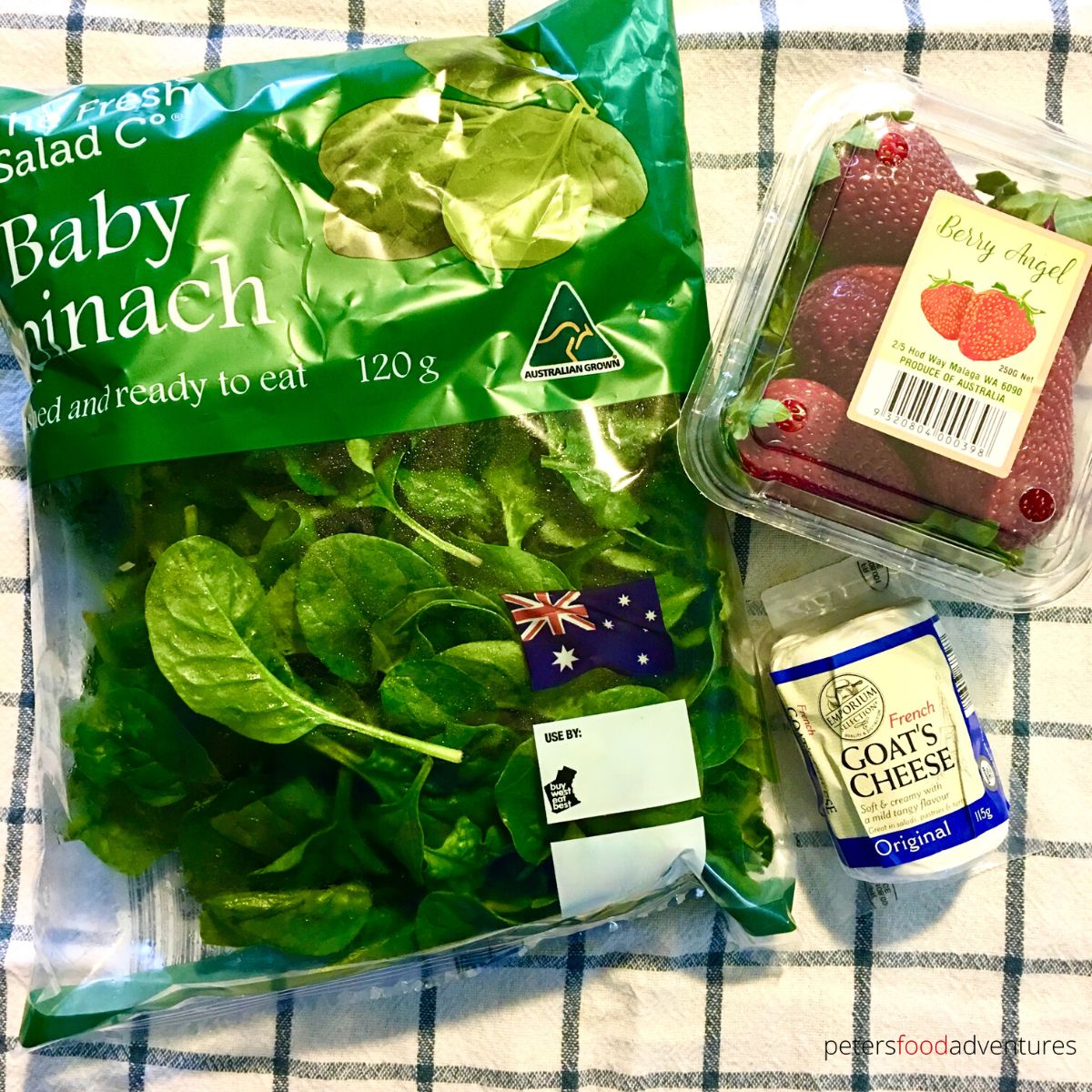 bag of spinach, goat cheese and strawberries