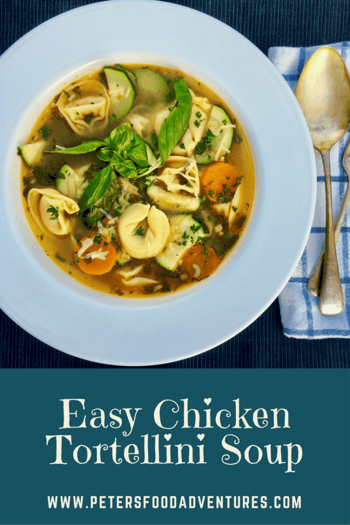 Easy Chicken Tortellini Soup with bacon and fresh basil. Delicious and hearty and loaded with vegetables. It's like a next level Minestrone Soup.