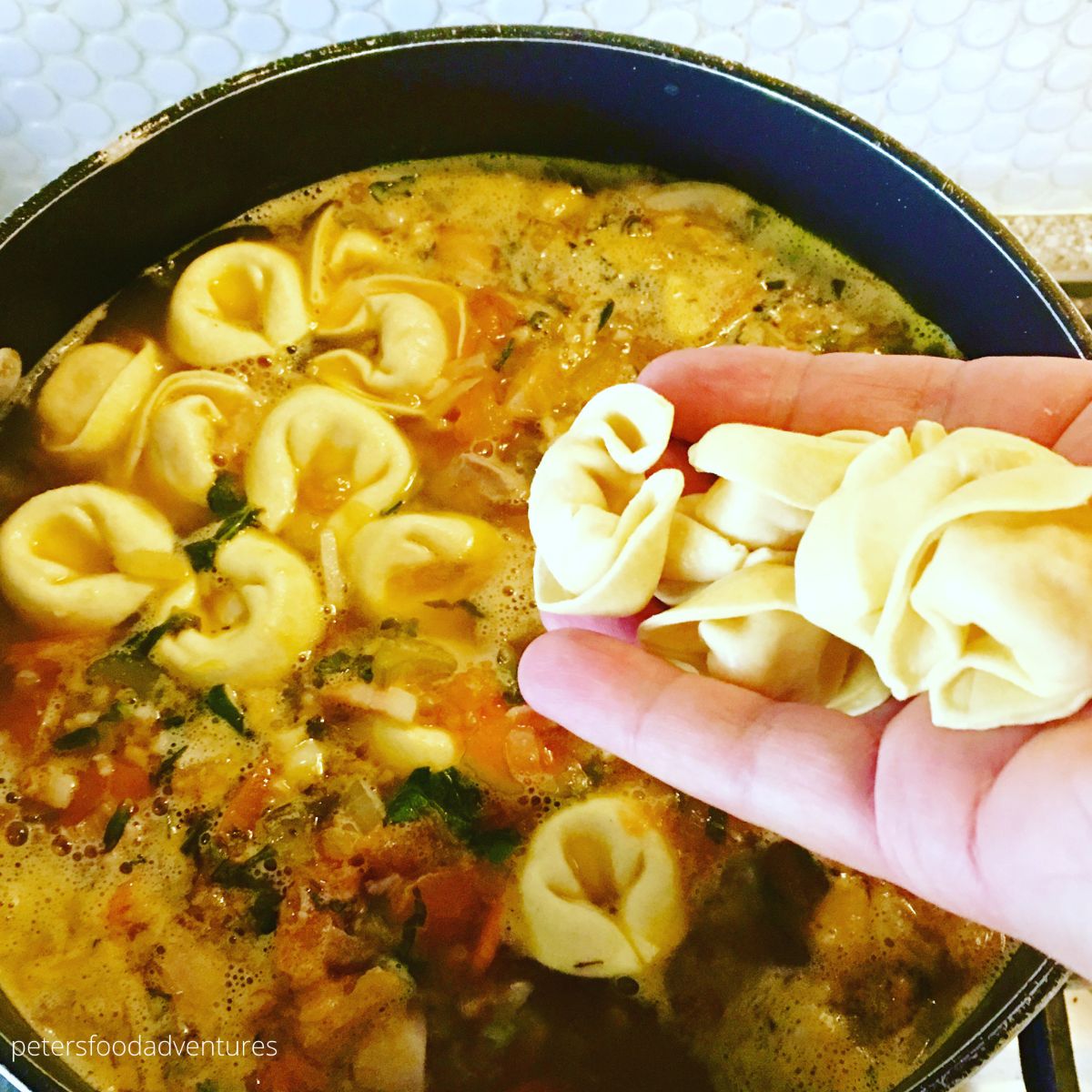tossing tortellini in soup
