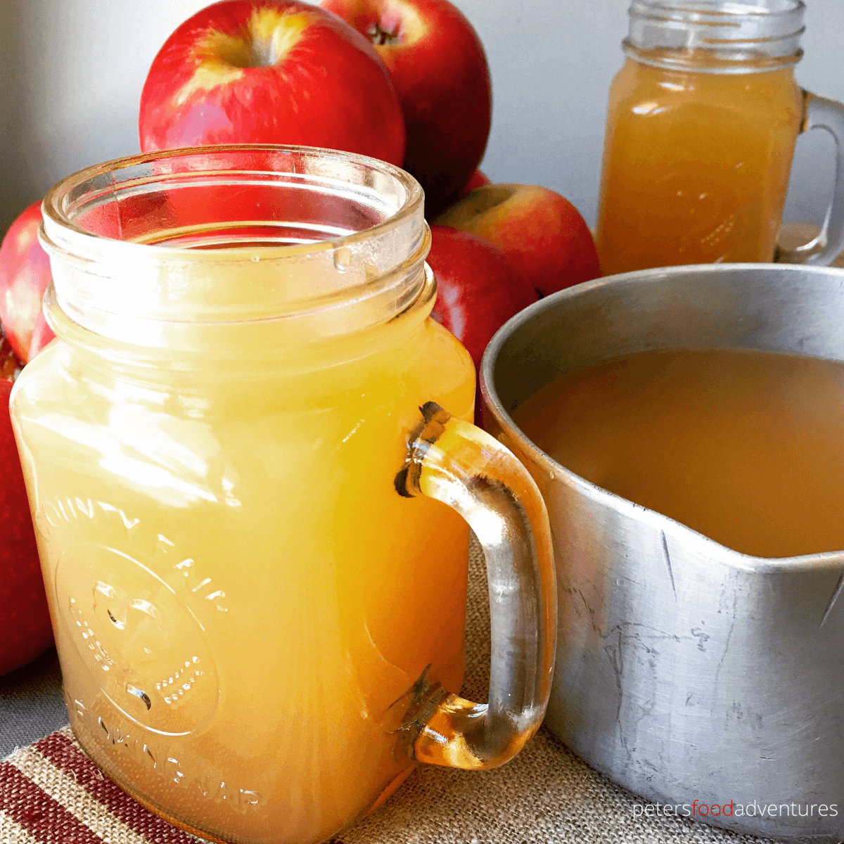 Hot Spiced Apple Cider - the aroma fills your whole house with this classic American spiced drink, especially popular during Thanksgiving and Christmas. This non-alcoholic mulled apple cider recipe is perfect for a cold chilly night, made with naturally cloudy apple juice