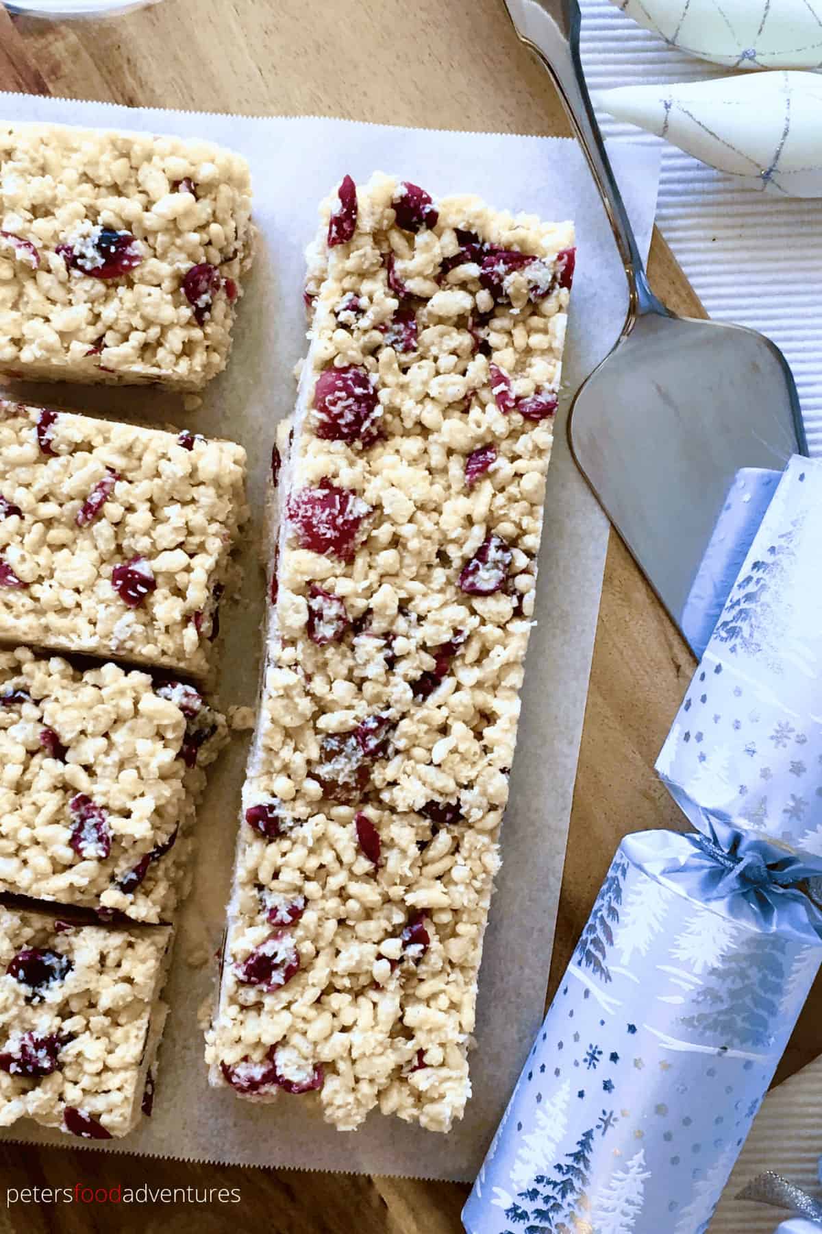 White Christmas recipe is an Australian favorite, easy to make, loved by kids and grown ups. Perfect for the holidays! Made with Crisco/Copha or coconut oil, dried cranberries, candied cherries, Rice Krispies and white chocolate.