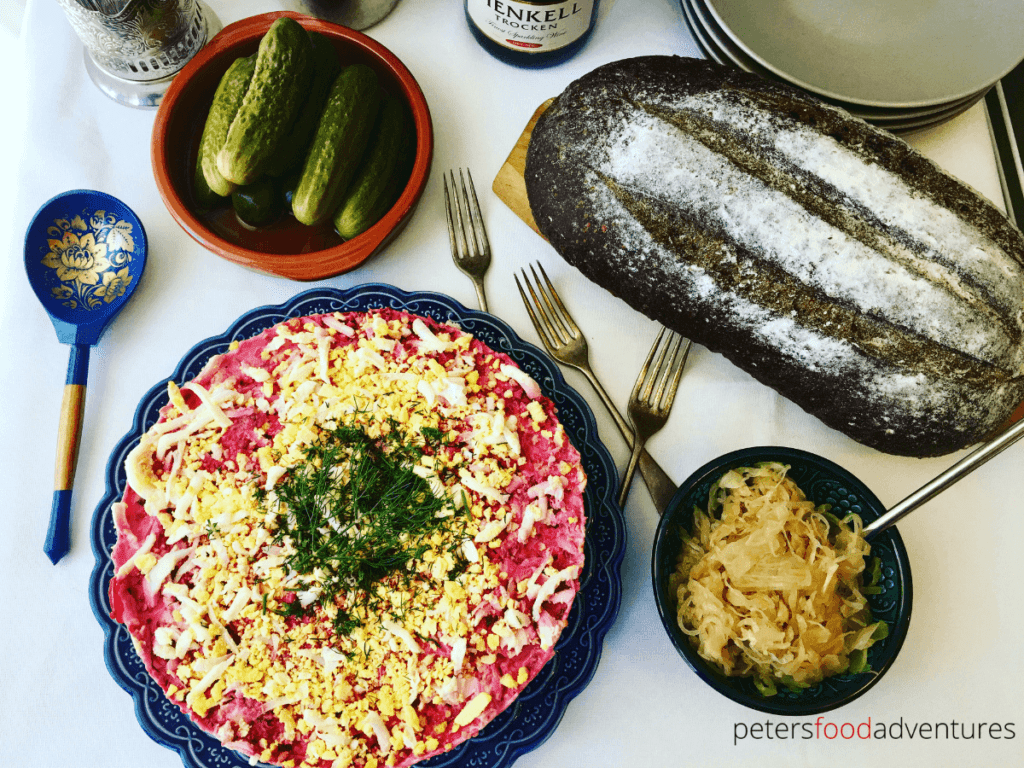 A classic Russian winter recipe, popular especially during New Year celebrations. A layered salad with beets, potatoes, carrots, eggs, herring and lots of mayonnaise! It's like a crazy dressed herring potato salad! - Herring Under a Fur Coat (Селёдка под шубой)