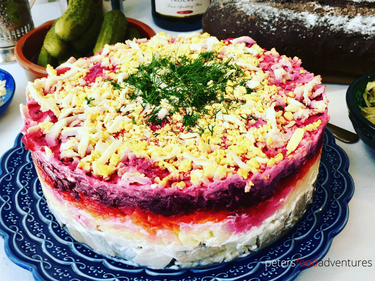 A classic Russian winter recipe, popular especially during New Year celebrations. A layered salad with beets, potatoes, carrots, eggs, herring and lots of mayonnaise! It's like a crazy dressed herring potato salad! - Herring Under a Fur Coat