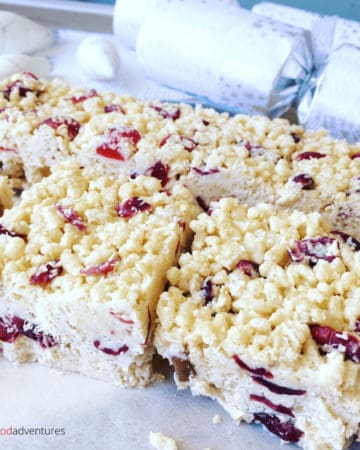 White Christmas recipe is an Australian favorite, easy to make, loved by kids and grown ups. Perfect for the holidays! Made with Crisco/Copha or coconut oil, dried cranberries, candied cherries, Rice Krispies and white chocolate.